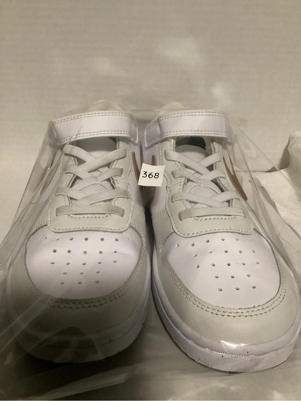 Nike Kids White Sneakers with Metallic Bronze Swoosh size 3Y